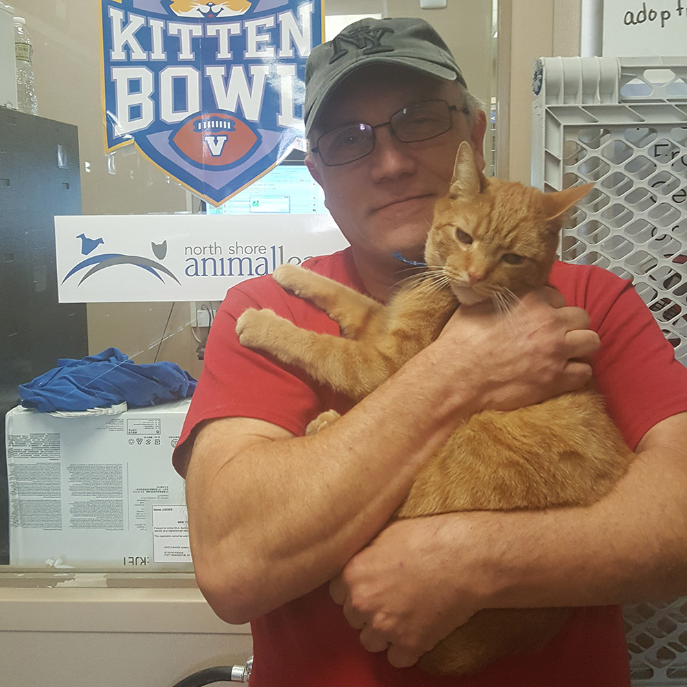 volunteer-month-2018-wk2-robert-winterton-with-orange-tabby