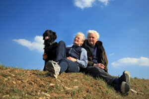 Elderly-Couple-With-Dog